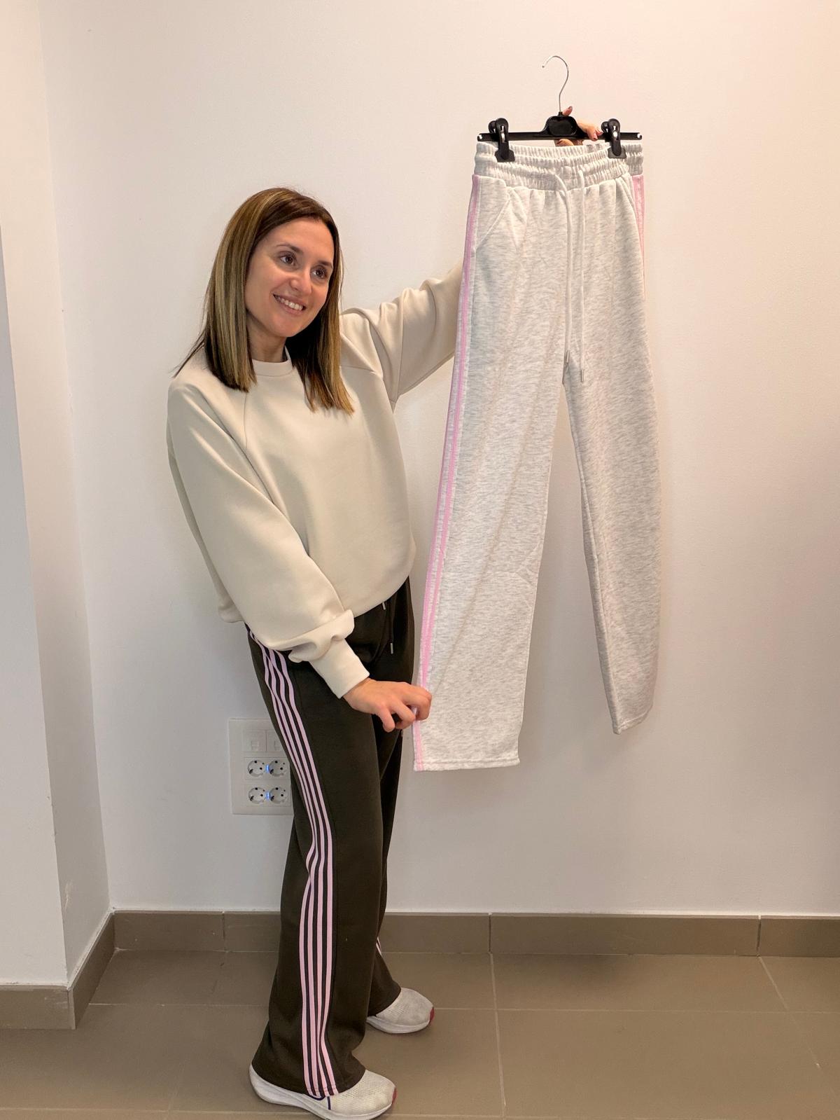 Pantalón deportivo con franjas rosas